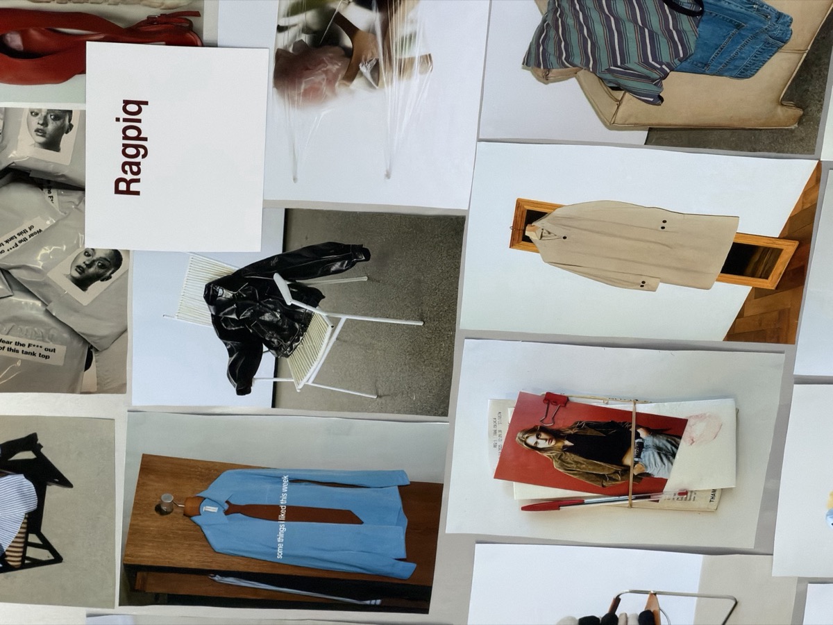The Ragpiq studio wall: printed looks and the Ragpiq card pinned up